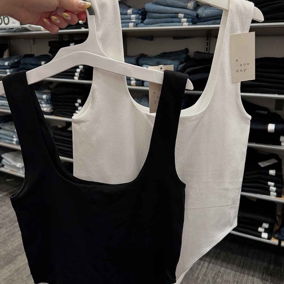 a new day Tops - NWOT Three Jersey Body Suits!